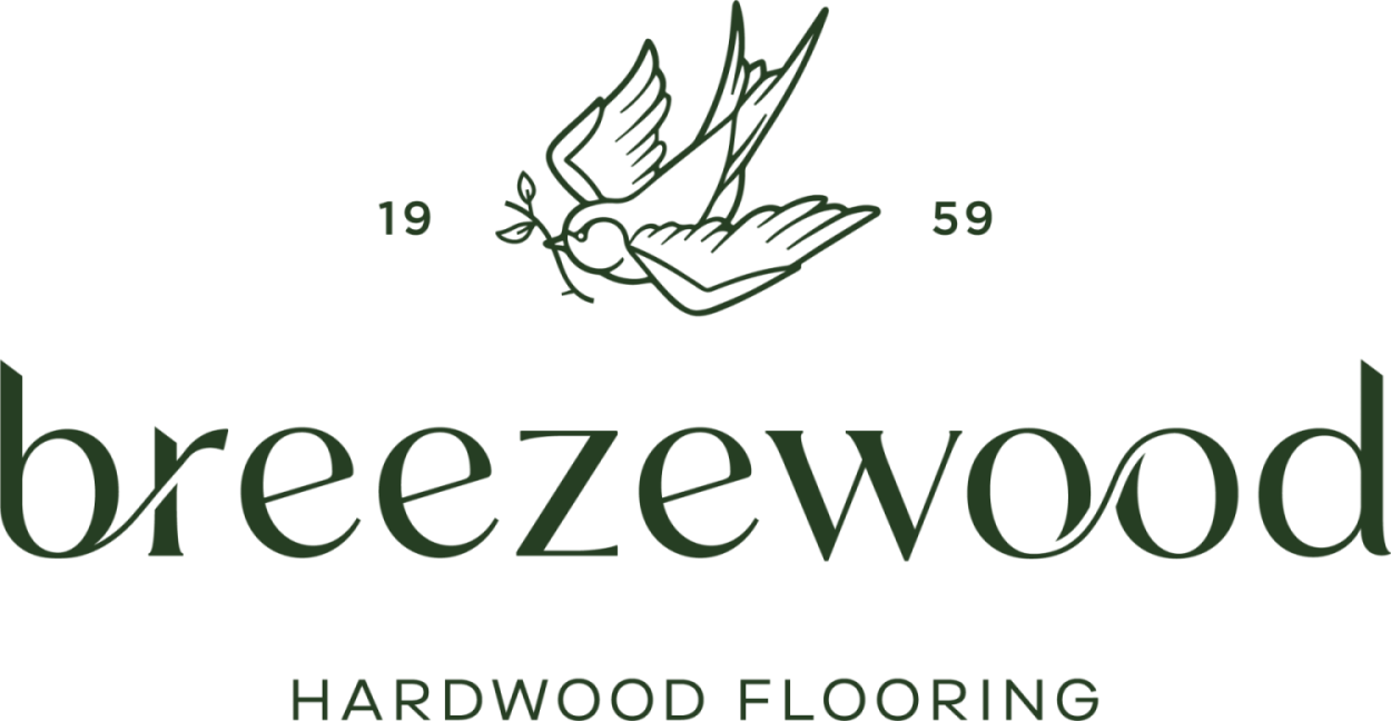 Breezewood - Transparent Logo - Centred with tag - FOREST Logo for Breezewood Hardwood Flooring, a prominent retail lumber shop, featuring a flying bird above the company name. The numbers '1959' are displayed on either side of the bird.